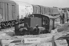 DSB, Ålborg, 11. July 1973.  Of reasons unknown to us, DSB Køf 287 had run away and came guideless at a rather nice speed running from north in at Årborg railwaystation. Here it was led into a blind track, running through the stop barrier, ending into a heap of sand as can be seen from the picture.